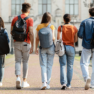 A group of students walking away from the camera